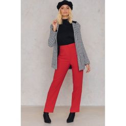Spodnie damskie: Trendyol Spodnie oversize Track - Red