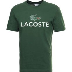 Lacoste Tshirt z nadrukiem vert. Zielone koszulki polo męskie Lacoste, xxl, z nadrukiem, z bawełny. Za 219,00 zł.