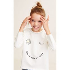 Mango Kids - Bluza dziecięca Marga 110-164 cm. Białe bluzy dziewczęce Mango Kids, z nadrukiem, z bawełny, bez rękawów, bez kaptura. Za 59,90 zł.