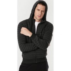 Czarna Bluza Haliva. Czarne bluzy męskie Born2be, xl, bez wzorów, bez kołnierzyka, bez rękawów, bez kaptura. Za 69,99 zł.