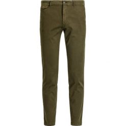 Spodnie materiałowe Calvin Klein K10K104039. Niebieskie jeansy męskie Calvin Klein, m, bez wzorów, z elastanu. W wyprzedaży za 229,00 zł.