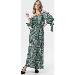 Zielona Sukienka Olaurae. Zielone sukienki damskie Born2be, s, z aplikacjami, z jeansu, bez kołnierzyka, z długim rękawem, długie, maxi. Za 69,99 zł.