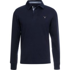 GANT THE ORIGINAL HEAVY RUGGER Koszulka polo evening blue. Niebieskie koszulki polo męskie GANT, s, bez wzorów, z bawełny, polo, z długim rękawem, długie. Za 379,00 zł.