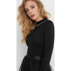 Sweter z błyszczącą nitką. Czarne swetry rozpinane damskie Orsay, xs, z dzianiny. Za 89,99 zł.