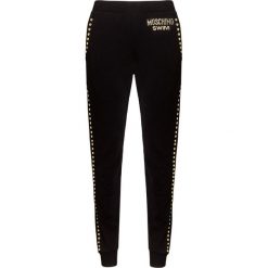 Spodnie MOSCHINO UNDERWEAR. Czarne spodnie damskie Moschino Underwear, z bawełny. W wyprzedaży za 523,00 zł.