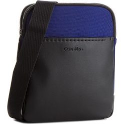 Saszetka CALVIN KLEIN - Multi Task Flat Cros K50K503775 447. Niebieskie torby męskie skórzane Calvin Klein, bez wzorów, ze skóry ekologicznej, młodzieżowe. W wyprzedaży za 269,00 zł.