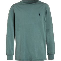 Polo Ralph Lauren Bluzka z długim rękawem hampton green. Zielone bluzki dziewczęce Polo Ralph Lauren, z bawełny, z długim rękawem. Za 129,00 zł.