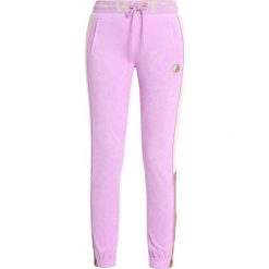 Fenty PUMA by Rihanna FITTED TRACK PANT Spodnie treningowe violet. Fioletowe spodnie damskie marki Fenty PUMA by Rihanna, m, z bawełny. Za 719,00 zł.