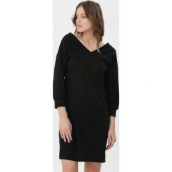 Czarna Sukienka Charnelle. Czarne sukienki damskie Born2be, s, mini. Za 69,99 zł.