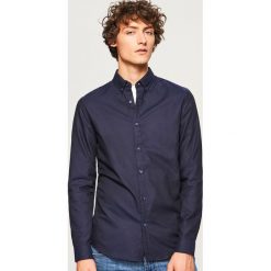 Koszula z bawełny oxford slim fit - Granatowy. Niebieskie koszule męskie Reserved, s, bez wzorów, z bawełny, bez kołnierzyka, bez rękawów. W wyprzedaży za 49,99 zł.