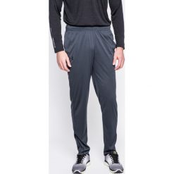 Under Armour - Spodnie UA Tech Pant. Szare spodnie męskie Under Armour, na co dzień, s, bez wzorów, z poliesteru, sportowe. W wyprzedaży za 139,90 zł.