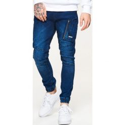 Jeansy męskie regular: Jeansy jogger slouch - Granatowy