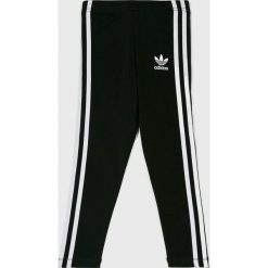 Adidas Originals - Legginsy dziecięce 104-128 cm. Czarne spodnie dziewczęce adidas Originals, bez wzorów, z elastanu. W wyprzedaży za 89,90 zł.