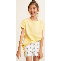 Mango Kids - Szorty dziecięce Isa 110-164 cm. Białe spodenki dziewczęce Mango Kids, bez wzorów, z elastanu, casualowe. W wyprzedaży za 29,90 zł.