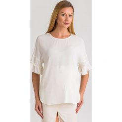 BLUZKA twinset. Zielone bluzki damskie Twinset, z aplikacjami, bez kołnierzyka, bez rękawów. Za 679,00 zł.