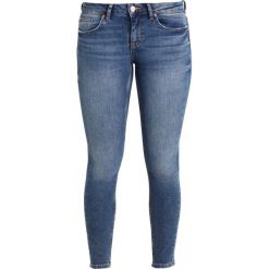 Gina Tricot KRISTEN Jeans Skinny Fit mid blue. Niebieskie jeansy damskie relaxed fit marki Gina Tricot, z bawełny. W wyprzedaży za 167,20 zł.