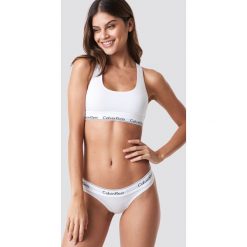 Calvin Klein Stringi Modern Cotton - White. Białe stringi Calvin Klein, s, z bawełny. Za 80,95 zł.