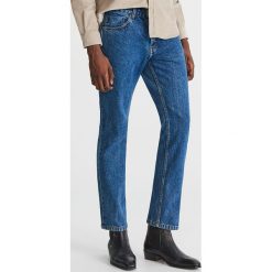 Jeansowe spodnie - Niebieski. Niebieskie spodnie męskie marki Reserved, m, bez wzorów, z jeansu. Za 149,99 zł.