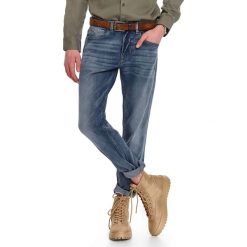 Spodnie denim slim fit. Niebieskie spodnie męskie Top Secret, na wiosnę, s, bez wzorów, z jeansu, klasyczne. W wyprzedaży za 149,99 zł.