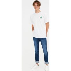 Niebieskie jeansy slim comfort fit. Niebieskie jeansy męskie marki Pull&Bear, m, bez wzorów. Za 89,90 zł.