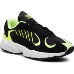 Buty adidas - Yung-1 EE5317 Cblack/Cblack/Hireye. Czarne półbuty męskie Adidas, na co dzień, bez wzorów, ze skóry, eleganckie, bez zapięcia. W wyprzedaży za 299,00 zł.
