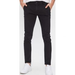 Jeansowe spodnie chino - Czarny. Czarne spodnie męskie House, m, bez wzorów, z jeansu. Za 139,99 zł.