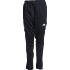 Adidas Performance CORE Spodnie treningowe black/white. Różowe spodnie chłopięce marki adidas Performance, z dzianiny, z okrągłym kołnierzem. Za 129,00 zł.