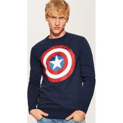 Bluza Kapitan Ameryka - Granatowy. Niebieskie bluzy męskie marki House, xl, bez wzorów, bez kołnierzyka, bez rękawów, bez kaptura. Za 99,99 zł.