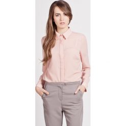 Elegancka koszula, K101 róż. Różowe koszule damskie Lanti, bez wzorów, z materiału, eleganckie, bez kołnierzyka, bez rękawów. Za 119,00 zł.
