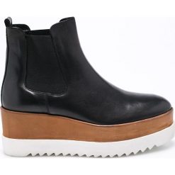 Carinii - Botki. Czarne buty zimowe damskie marki Carinii, z materiału, z okrągłym noskiem, na obcasie. W wyprzedaży za 219,90 zł.