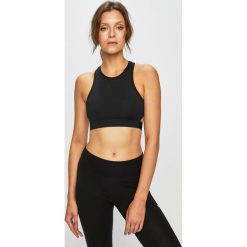 Nike - Biustonosz. Czarne biustonosze sportowe damskie Nike, xs, bez wzorów, z elastanu. W wyprzedaży za 139,90 zł.