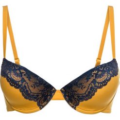 Biustonosz usztywniany bonprix musztardowo-ciemnoniebieski. Pomarańczowe biustonosze bonprix, bez wzorów, z koronki. Za 34,99 zł.