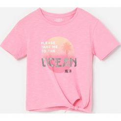 Bawełniany t-shirt z napisem 3d - Różowy. Różowe t-shirty damskie Reserved, z napisami, z bawełny, bez kołnierzyka. W wyprzedaży za 9,99 zł.