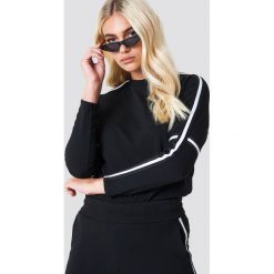 Sisters Point Bluza Gings 1 - Black. Czarne bluzy damskie Sisters Point, w paski, z elastanu, bez rękawów, bez kaptura. Za 141,95 zł.