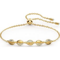 Swarovski - Bransoletka Shell Cowrie. Żółte bransoletki damskie Swarovski, z kryształem, metalowe. Za 349,90 zł.
