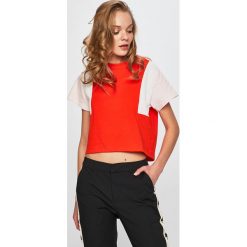 Only - Top. Pomarańczowe topy damskie marki ONLY, s, z bawełny, z okrągłym kołnierzem. Za 69,90 zł.
