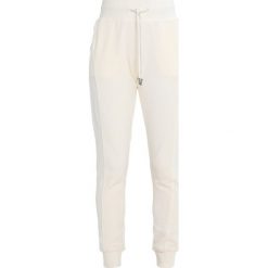 Spodnie dresowe damskie: Fenty PUMA by Rihanna FITTED TRACK Spodnie treningowe vanilla ice