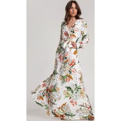 Biała Sukienka Thelmelle. Białe sukienki damskie Renee, na lato, s, bez wzorów, bez kołnierzyka, bez rękawów. Za 149,99 zł.