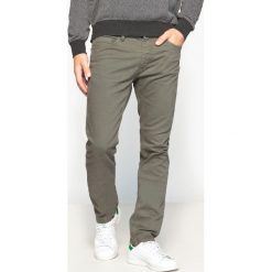 Dżinsy slim. Brązowe jeansy męskie slim marki La Redoute Collections. Za 136,46 zł.