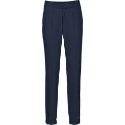 Spodnie Loose Fit bonprix ciemnoniebieski. Niebieskie spodnie sportowe damskie marki bonprix, w paski. Za 59,99 zł.