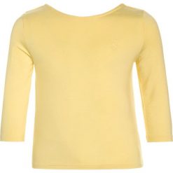 Polo Ralph Lauren Bluzka z długim rękawem english maize. Żółte bluzki dziewczęce Polo Ralph Lauren, z elastanu, polo, z długim rękawem. W wyprzedaży za 160,30 zł.