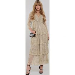 Beżowa Sukienka Queta. Brązowe sukienki damskie Renee, s, z aplikacjami, eleganckie, maxi, kopertowe. Za 179,99 zł.