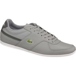 Lacoste Taloire SPM0037007. Szare buty sportowe męskie marki Lacoste, ze skóry, bez zapięcia. W wyprzedaży za 369,99 zł.