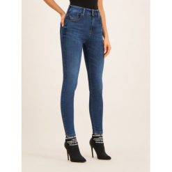 Jeansy Slim Fit Diesel Slandy-High 00SMLX 089AJ. Niebieskie jeansy damskie Diesel, bez wzorów, z elastanu. W wyprzedaży za 369,00 zł.