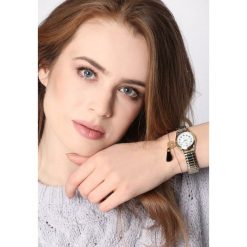 Złota Bransoletka Avail. Żółte bransoletki damskie z cyrkoniami marki Born2be, złote. Za 29,99 zł.