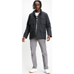 Levi's Płaszcz Czarny. Czarne płaszcze męskie Levi's®, na wiosnę, s, bez wzorów, z materiału, bez kaptura. Za 567,95 zł.