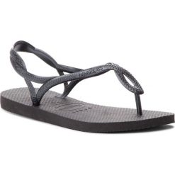 Sandały HAVAIANAS - Luna 41296970090 Black. Czarne klapki damskie Havaianas, bez wzorów, z tworzywa sztucznego, bez obcasa. W wyprzedaży za 69,00 zł.