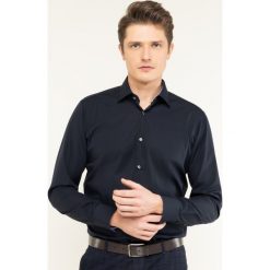 Koszula Boss Goran 50427537. Niebieskie koszule męskie Boss, m, bez wzorów, z bawełny, biznesowe, bez kołnierzyka, bez rękawów. W wyprzedaży za 339,00 zł.