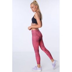 Legginsy sportowe we wzory fluo różowe MR15285. Różowe legginsy damskie marki Fasardi, s, bez wzorów. Za 59,00 zł.