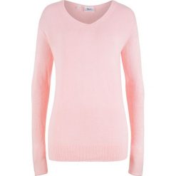 Sweter oversize z rozcięciem bonprix pastelowy jasnoróżowy. Różowe swetry damskie bonprix, bez wzorów, bez rękawów, bez kaptura. Za 54,99 zł.